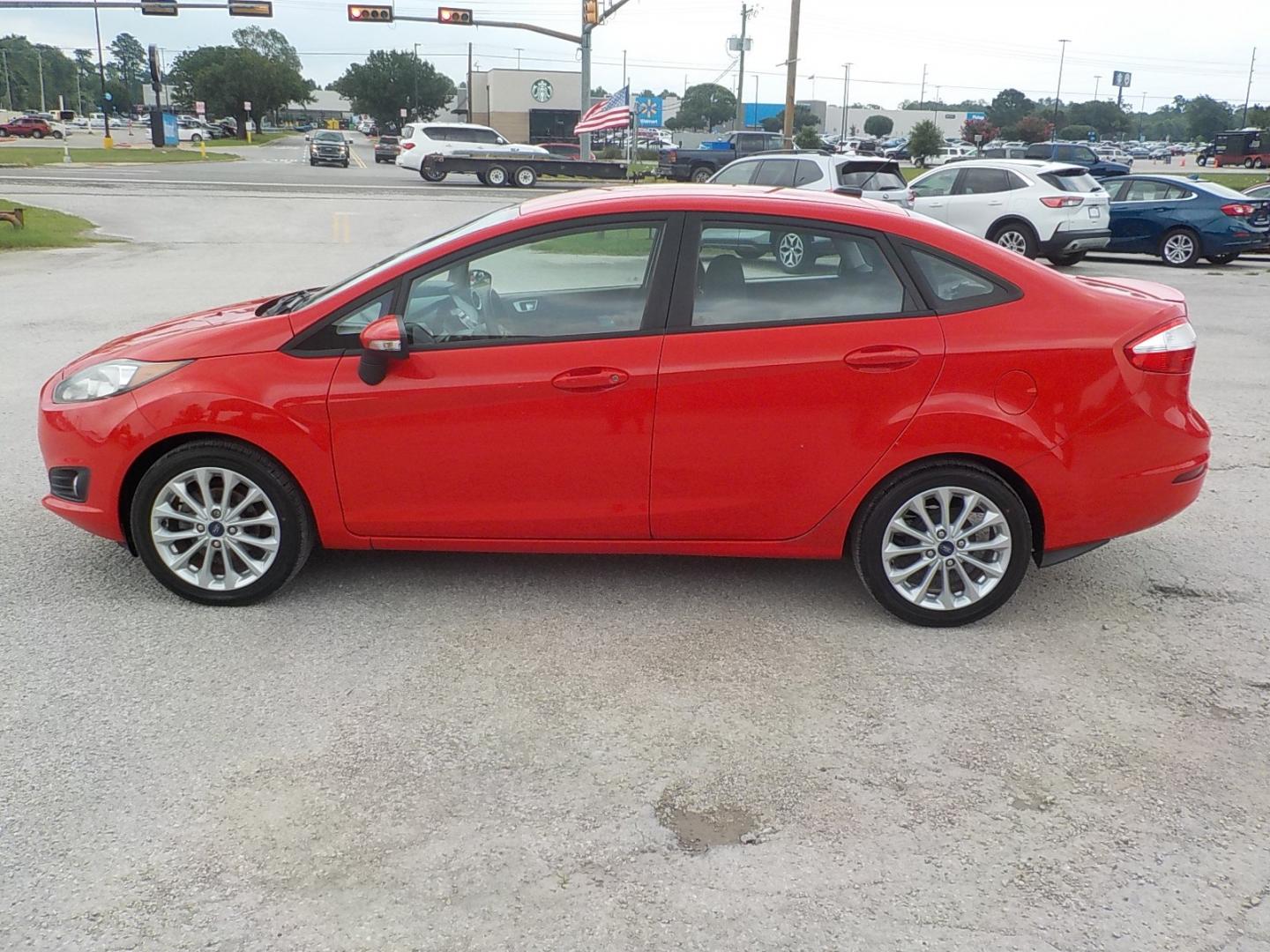 2014 Red /Charcoal Ford Fiesta (3FADP4BJ0EM) , Automatic transmission, located at 1617 W Church Street, Livingston, TX, 77351, (936) 327-3600, 30.710995, -94.951157 - WOW!! Need to check this one out for the price range it's in! You won't be disappointed! - Photo#4